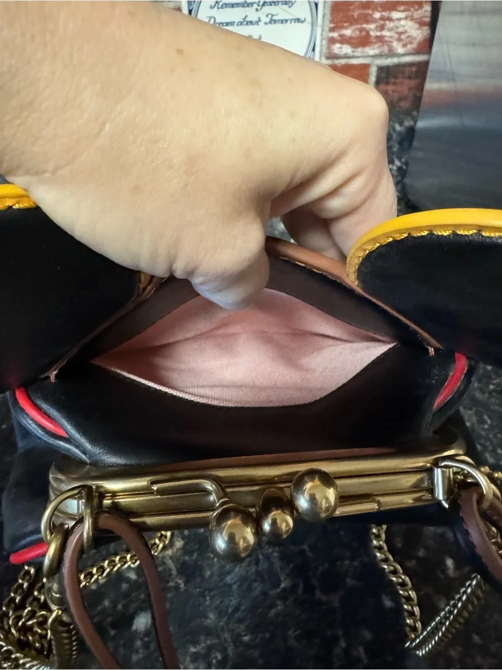 Coach Black Mini Bag with Yellow Ear Trim and Gold Chain